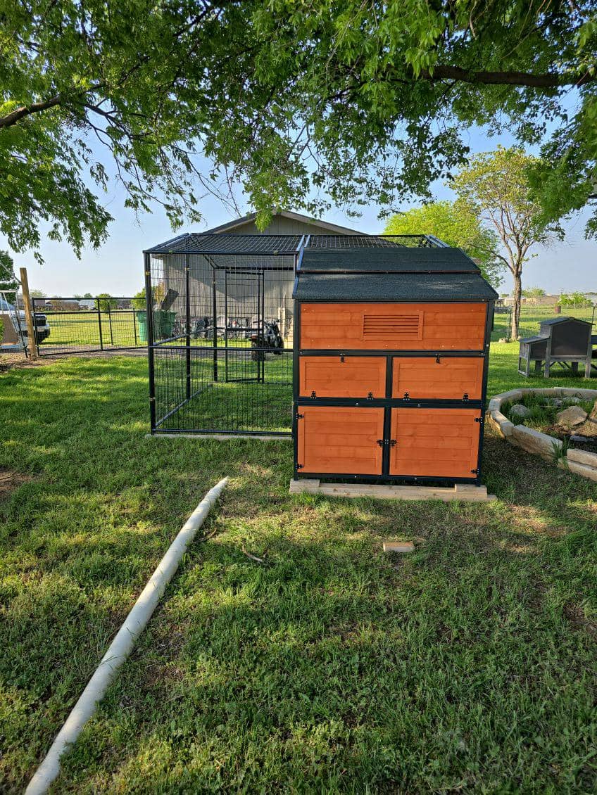 Large outdoor storage shed assembled and installed in a residential backyard